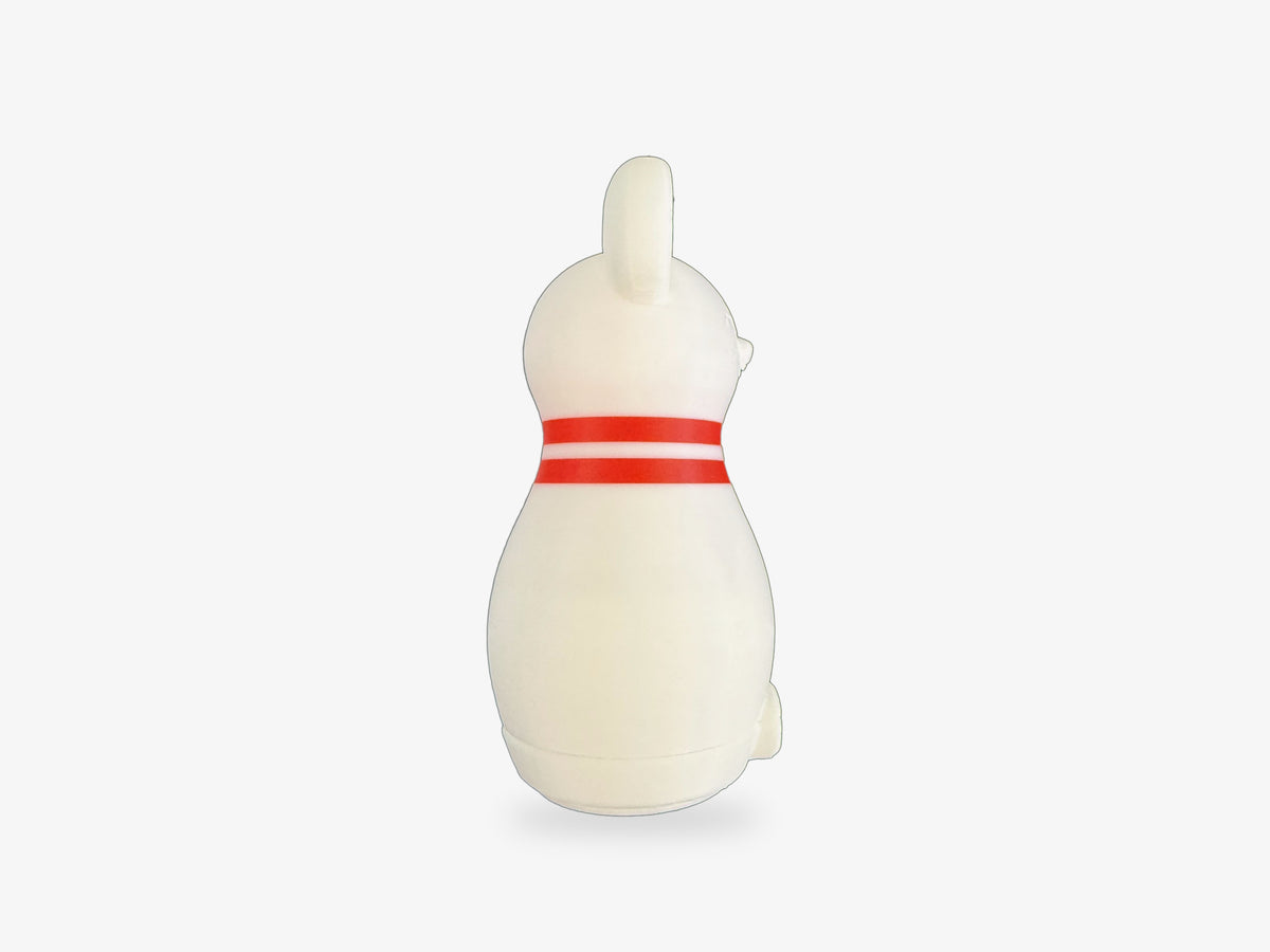 Right side of a Mouse Bowling pin, showing the mouse's ear and two red neck stripes
